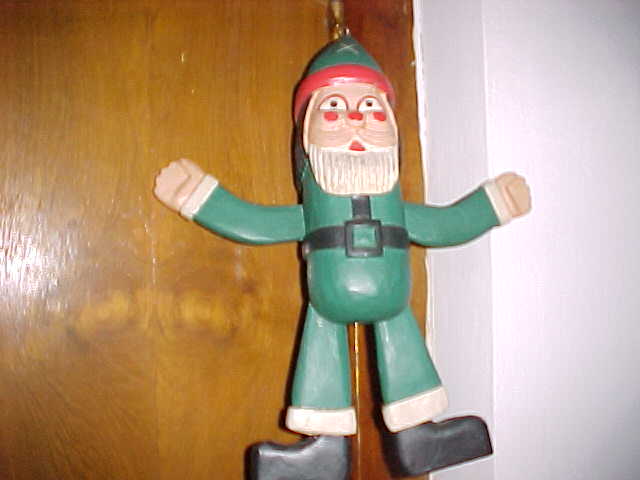 Green Santa Claus pull-puppet (Indonesia, The Travel Addicts)