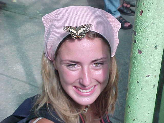Butterfly on the head of Sarah from Aberdeen (Malaysia, The Travel Addicts)