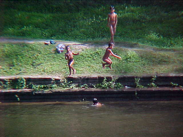 Children playing in the pool at the celestial palace :  (Cambodia, The Travel Addicts)