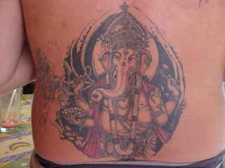 Ganesha tattoo : This glorious piece of art was on the back of a German tourist named Jan that we befriended (The Travel Addicts, Thailand)