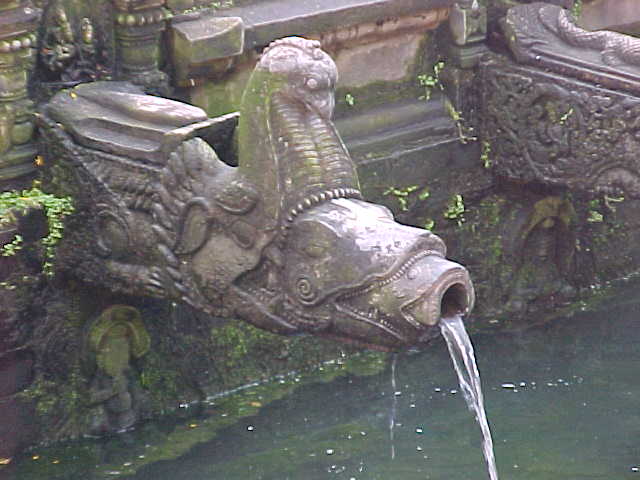 Alligator spewing water at Patan's Durbar square (Nepal, The Travel Addicts)