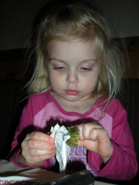 DSCN0055.jpg-Isabella eats an unknown vegetable