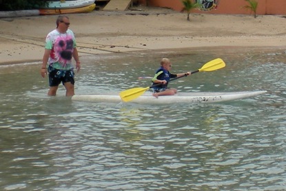Paddling the board like a kayak